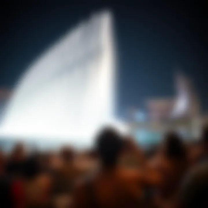 Audience Captivated by the Fountain Show Audience enjoying the Dubai Fountain Show