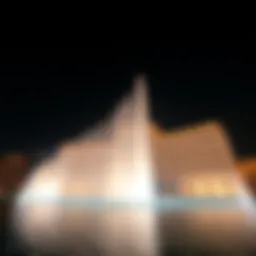 The Dubai Fountain illuminated at night