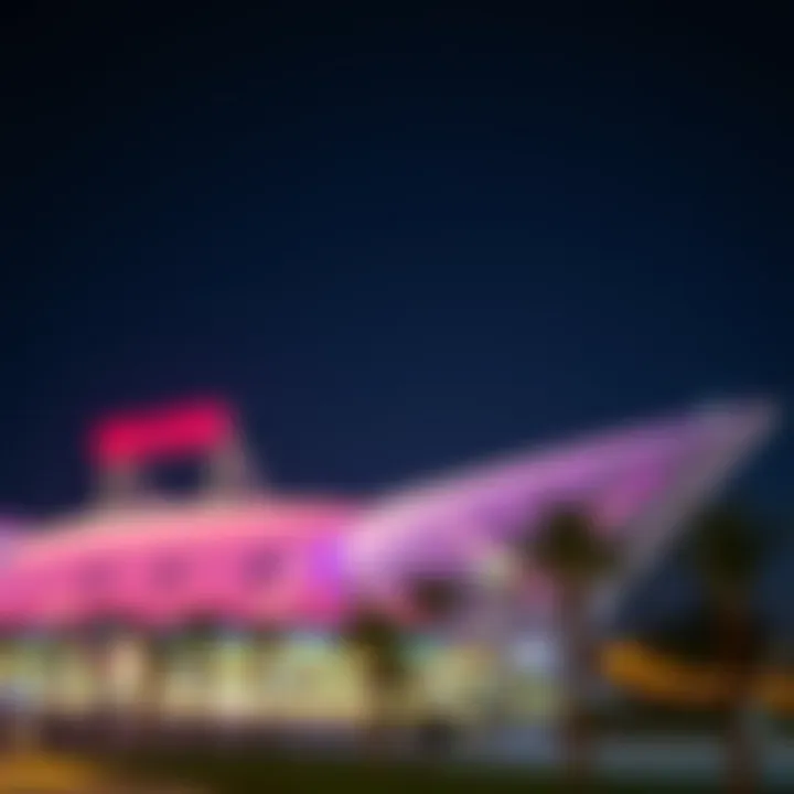 Nighttime illumination of Dubai Arena highlighting its prominence