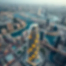 Aerial view showcasing Waves Tower's unique architectural design against the Dubai skyline